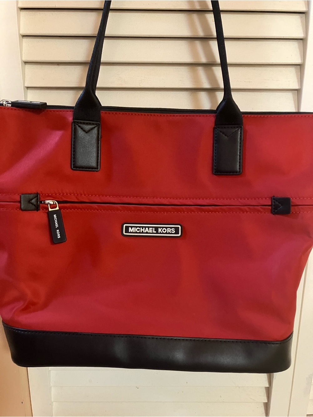 Michael Kors Red Tote with Black Trim and Handles